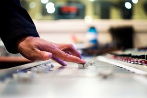 DJ at a sound board